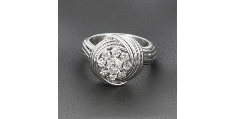 Bague tourbillon en or blanc 750 ‰ et diamants
