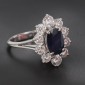 Bague marguerite en or blanc 750 ‰ saphir et diamants