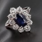 Bague marguerite en or blanc 750 ‰ saphir et diamants