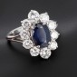 Bague marguerite en or blanc 750 ‰ saphir et diamants