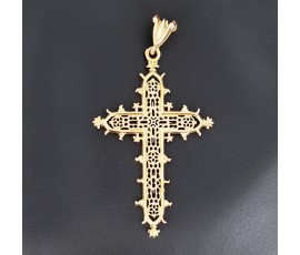 Pendentif  religieux en forme de croix ajourée et bordée de motifs en or jaune 750 ‰  - B10306