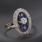 Bague art déco en or blanc 750 ‰ et platine  présentant diamants et saphirs calibrés- B10323