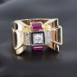 Bague tank en or jaune 750‰  diamant central de 0,25 ct, rubis calibrés et diamants taille rose - B1041913,20 gr - Tdd : 57