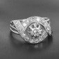 Bague tourbillon or blanc 750 ‰  diamant de 0,25ct env réhaussé de 20 diamants 8/8è pour 0,80 ct environ - B10482