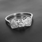 Bague nœud or blanc 750‰ et platine présentant un ensemble de 7 diamants taille ancienne pour 0,50 ct env- B10493
