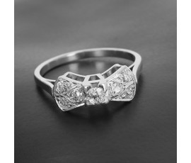 Bague nœud or blanc 750‰ et platine présentant un ensemble de 7 diamants taille ancienne pour 0,50 ct env- B10493