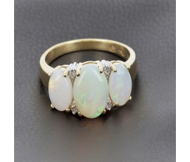 Bague jarretière en or jaune 750/ème et opale - B10012