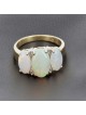 Bague jarretière en or jaune 750 ‰ et opale.