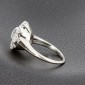 Bague marguerite or blanc 750 ‰ et diamants
